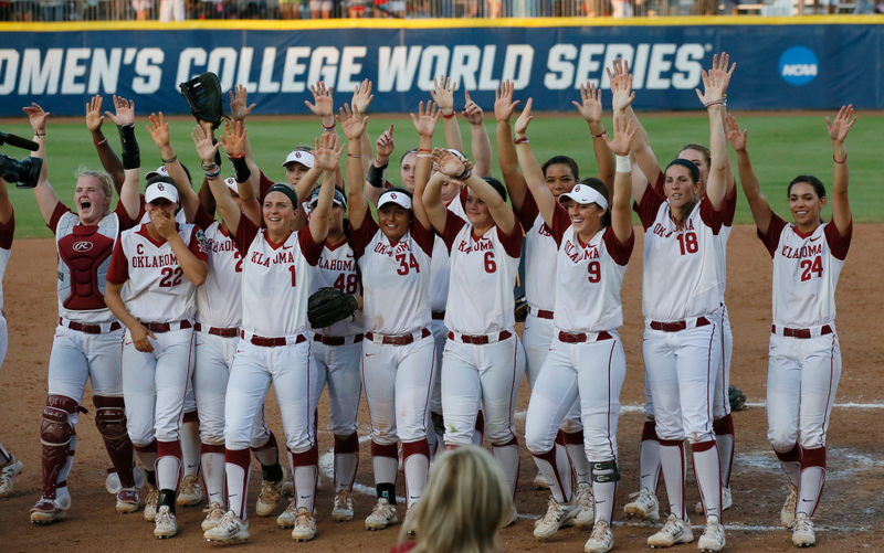 Oklahoma celebrates a win in the Women’s College World Series of softball, 2016. Photo: AP Images.
